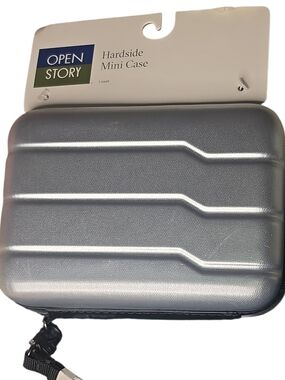 Open Story Hardside Mini Case. Used To Protect Items While Traveling.